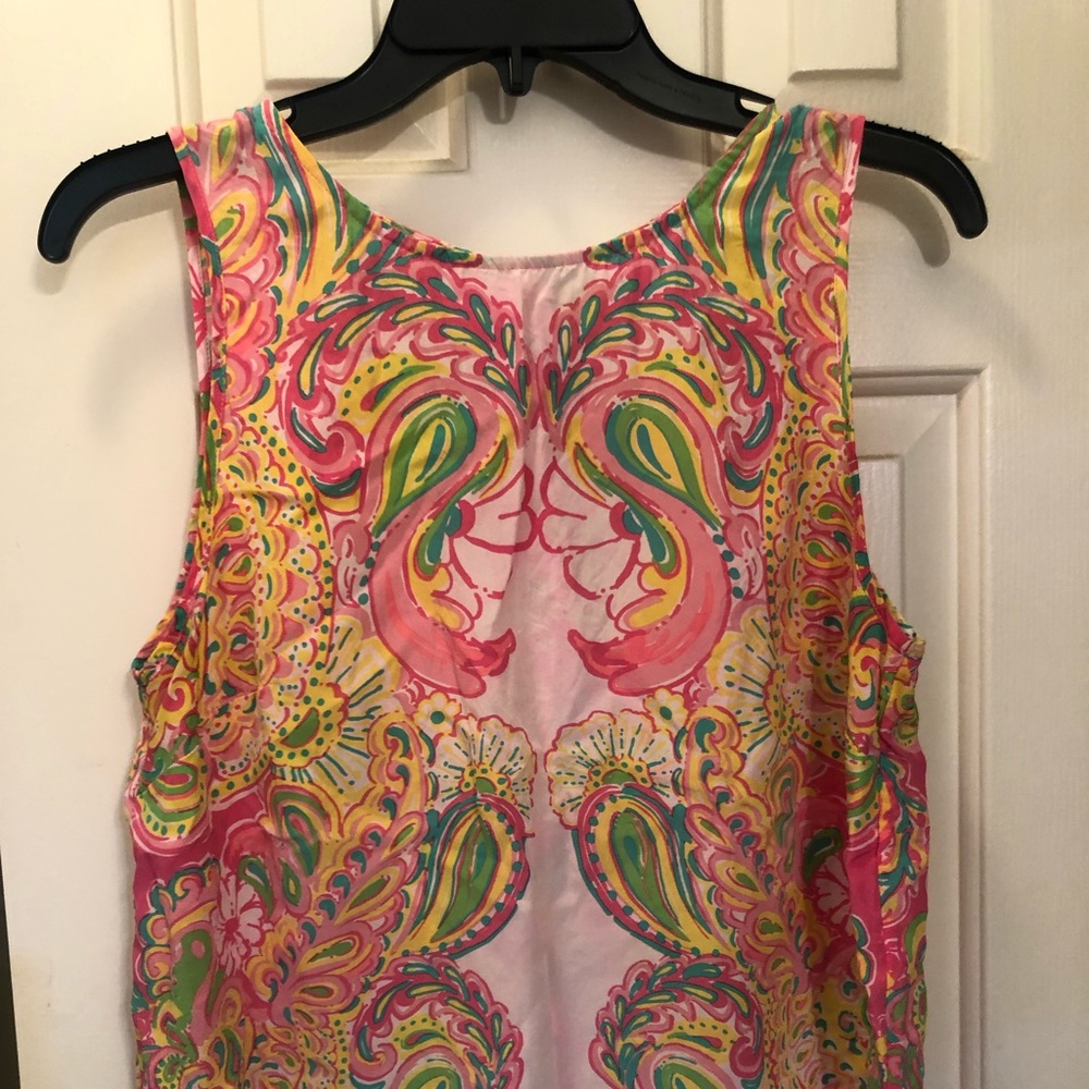 Gorgeous top with bright colors and gold bottoms.